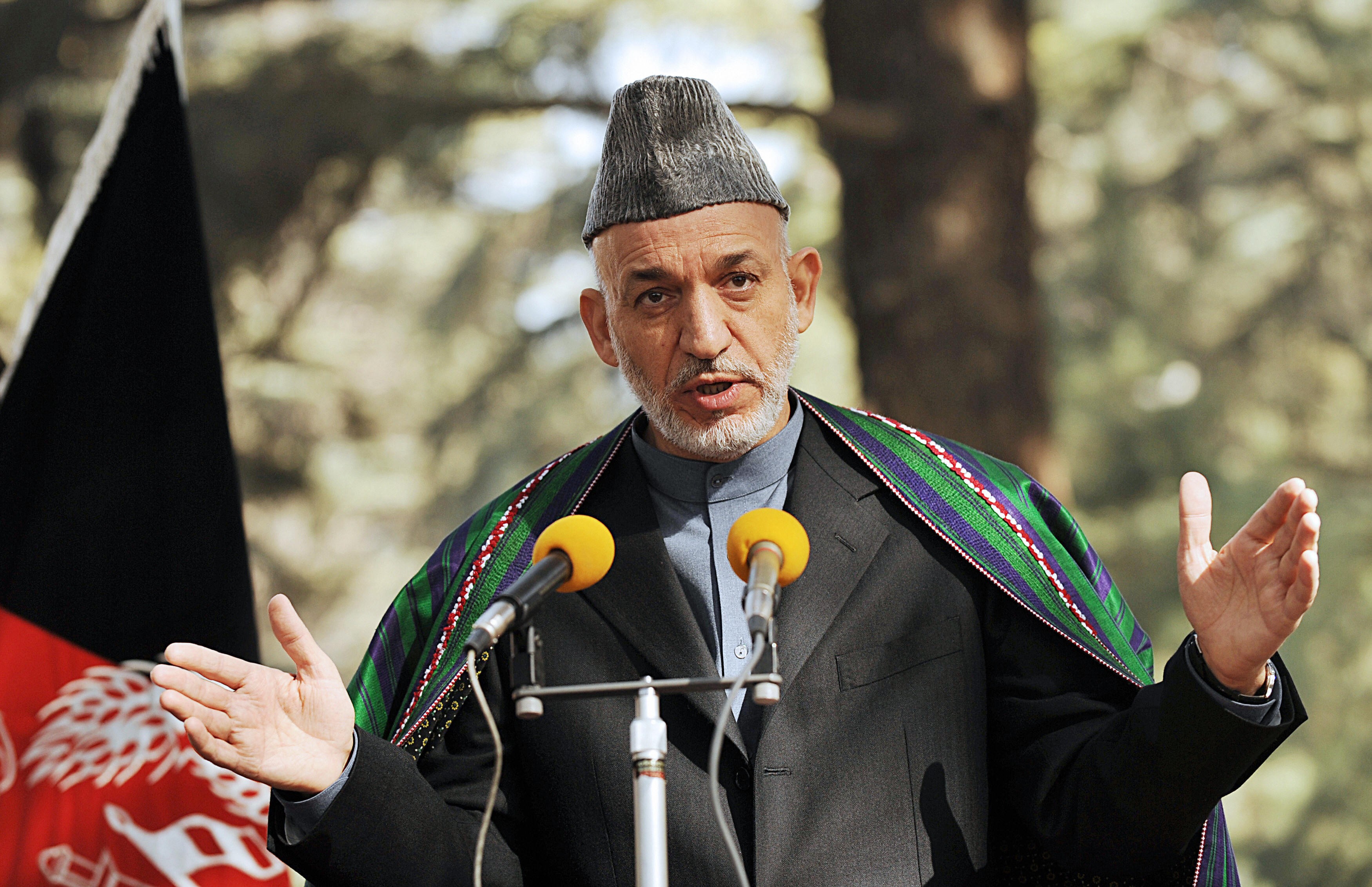 Afghan President Hamid Karzai addresses media representatives during a press conference at the Presidential palace in Kabul on November 5, 2008. Karzai congratulated Barack Obama on his US election victory, saying it took the world into a 